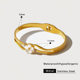 Sakura Dorada™ — Brazalete Botánico en Oro 18K