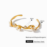 Sakura Dorada™ — Brazalete Botánico en Oro 18K