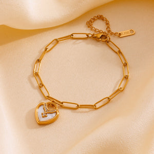 Golden Heart Set™ — Conjunto de Joyería con Corazones Dorados y Esmalte Blanco | Collar, Pulsera y Pantallas
