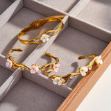Sakura Dorada™ — Brazalete Botánico en Oro 18K