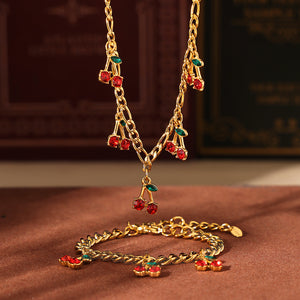 Cherry Gold™ — Conjunto de Joyería con Cerezas Esmaltadas en Oro | Collar y Pulsera Stainless Steel