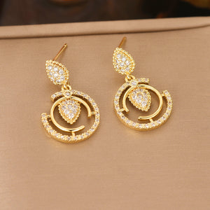Glamour Dorado™ — Conjunto de Joyería Dorada con Circonias | Collar, Pantallas y Anillo Stainless Steel
