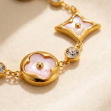 Trébol Estelar Set rosado — detalle de trébol, estrella y zirconia