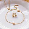 Golden Clarity™ — Conjunto de Joyería Minimalista con Micro Circonias Doradas | Collar, Pulsera y Pantallas Stainless Steel
