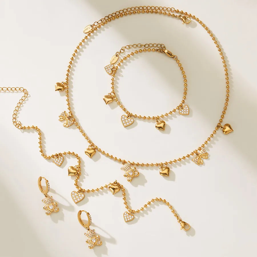 Encanto Brillante™ — Conjunto de Joyería con Corazones y Mariposas en Cadenas Finas | Collar, Pulsera, Pantallas y Anillo Stainless Steel