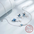 Mariposa Azul™ — Conjunto de Joyería con Mariposas de Cristal Azul en Plata 925 | Collar, Pulsera y Pantallas